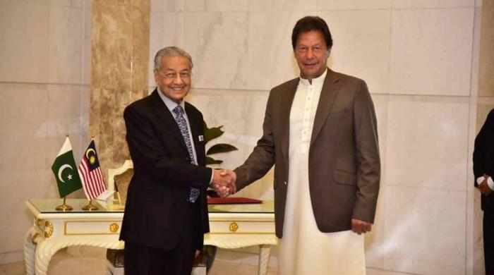 Mahathir Mohammad and Imran Khan