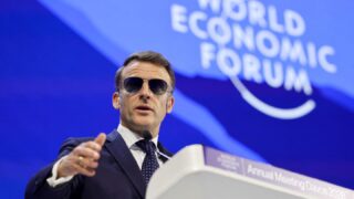 Macron Warns of "Lawless World" in Davos Clash with Trump