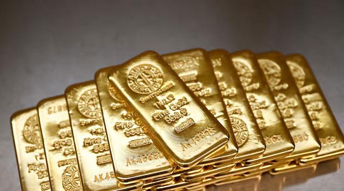 Gold Hits Three-Week High Amid US Tariff Uncertainty