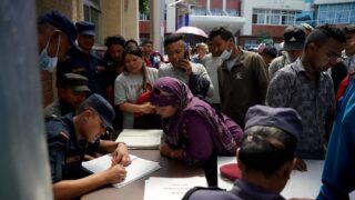 Desperate Families Wait Outside Nepal Hospitals After Deadly Floods